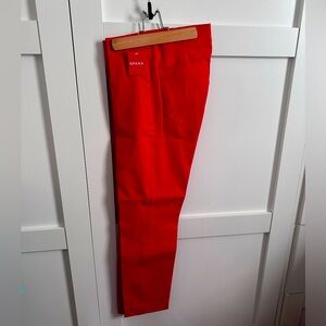 NWT Spanx on-the-go ankle slim straight leg pants in true red, size medium